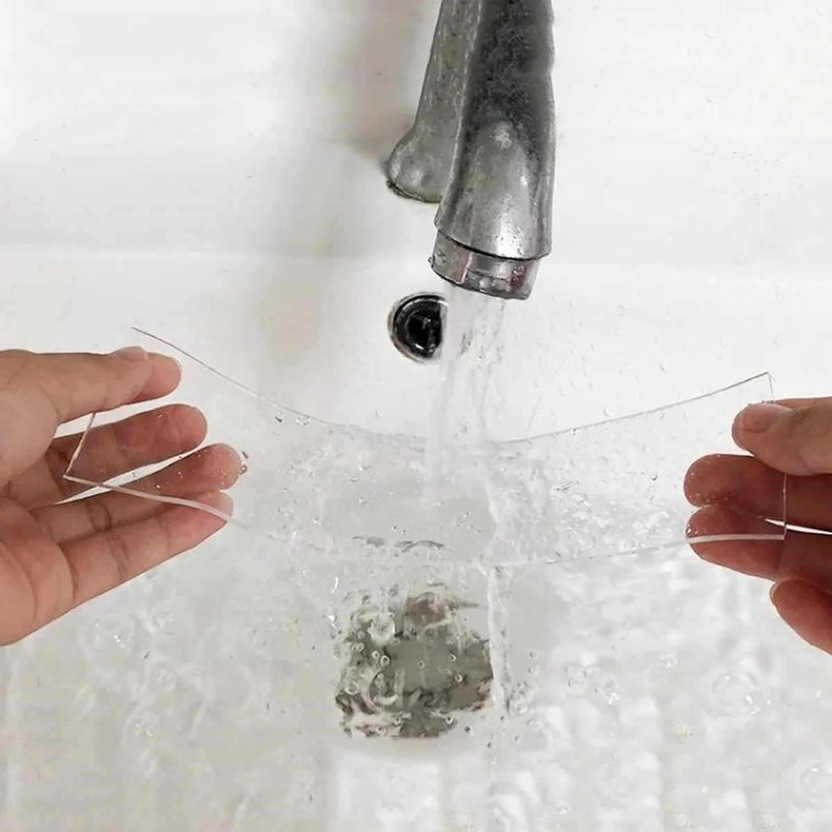 Merkloos Nano Tape - Montage Tape - Premium Grip Tape - Dubbelzijdig - Afwasbaar - Herbruikbaar - 1 Meter 4 Merkloos Nano Tape - Montage Tape - Premium Grip Tape - Dubbelzijdig - Afwasbaar - Herbruikbaar - 1 Meter - Afbeelding 2